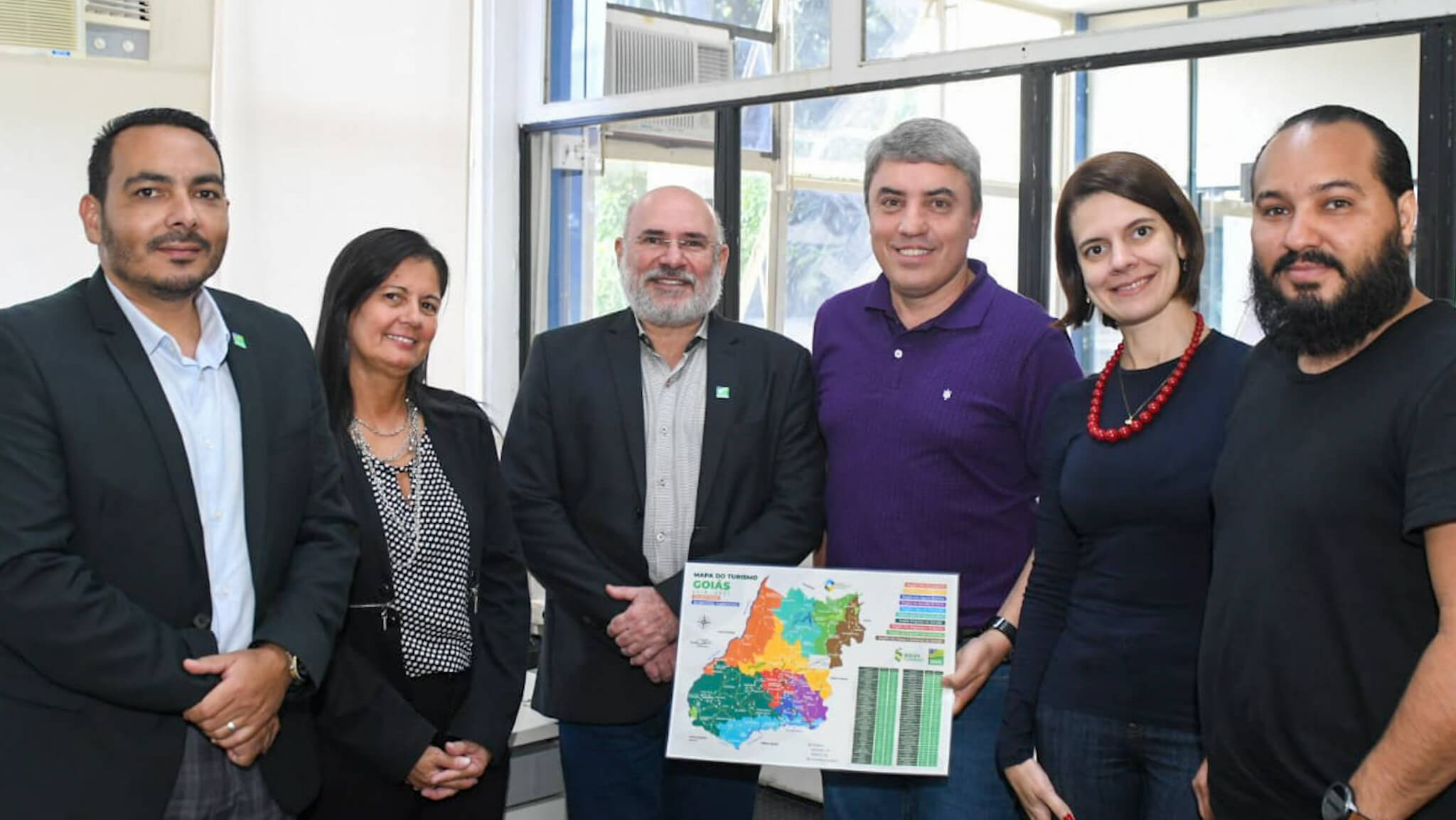Equipes da ABC e da Goiás Turismo celebram parceria